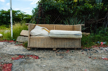 abandoned sofa in the middle of a street