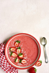 Strawberry banana smoothie bowl.Top view with copy space.