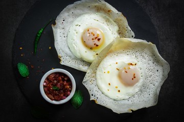 Homemade Egg Hopper or Bittara Appa / Sri Lankan breakfast Appam - obrazy, fototapety, plakaty