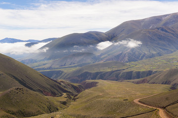 View of the descending road with a geological formation on the road way Humahuaca to Iruya in the...