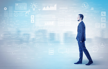 Handsome businessman walking in suit with briefcase on his hand and database concept around
