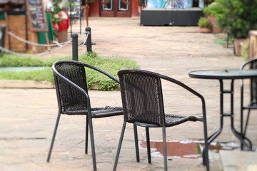 Fototapeta na wymiar Table and chair in garden