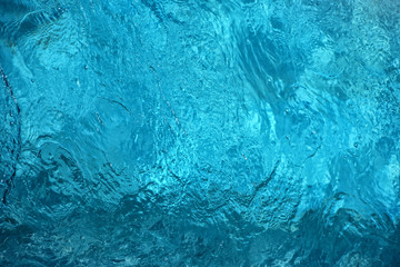Blue ripped water in swimming pool