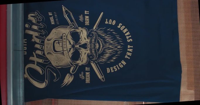 Silk screen printing process - making a print on a t-shirt. 4K UHD