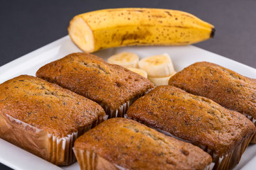Fresh Banana Loafs with banana slices on a white tray