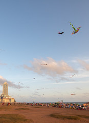 Sunset over flying kites at the Galle Face beachfront urban park area in Colombo Sri Lanka Asia