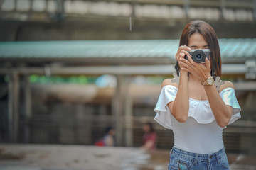 Fototapeta premium Young asian woman traveling to landmark in Bangkok Thailand.