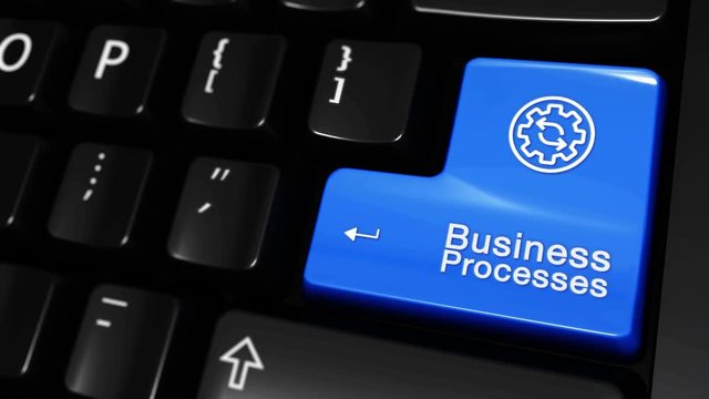 306. Business Processes Moving Motion On Blue Enter Button On Modern Computer Keyboard with Text and icon Labeled. Selected Focus Key is Pressing Animation. Business Management Concept