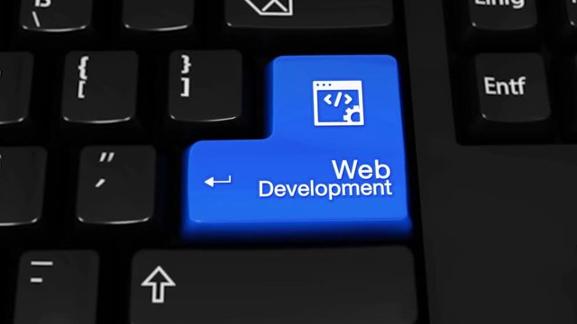 309. Web Development Rotation Motion On Blue Enter Button On Modern Computer Keyboard with Text and icon Labeled. Selected Focus Key is Pressing Animation. Website Development Concept