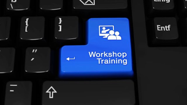 315. Workshop Training Rotation Motion On Blue Enter Button On Modern Computer Keyboard with Text and icon Labeled. Selected Focus Key is Pressing Animation. Business Management Concept