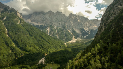 Aerial view of beautiful Triglav mountains, part of Alps in Slovenia. Beautiful clouds on top of mountains.
