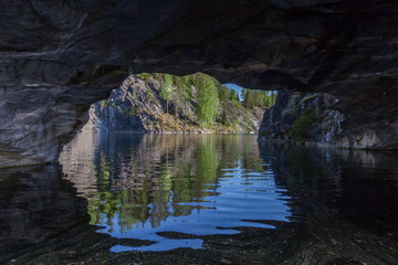 Entrance to the adit in the mountain park of Ruskeala, Karelia