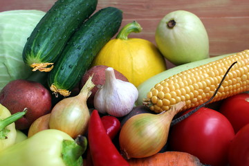 collected fresh autumn harvest of vegetables from the beds