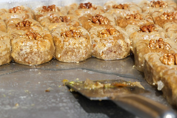Traditional Turkish dessert baklava with nuts and honey. Close-up