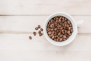 Close up of coffee beans in a cup