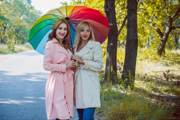 Fall, nature and people concept - Young beautiful women have a rest in autumn time. Pretty nice girls travel is relax. Enjoying at day, concept adventure stylish vacations outdoor 