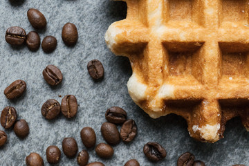 biscuits and coffee on a gray background, stone. Food, dessert, waffle