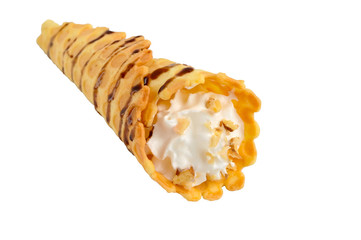 Delicious honeyed waffles, twisted into cones with cream, nuts, chocolate topping isolated on white background.
