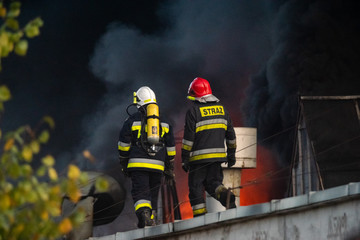 firefighters during the action of extinguishing a powerful fire of a recycling company.Poland, Szczecin