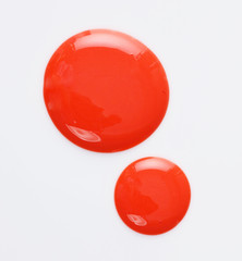 Texture of the Red Lipgloss liquid, white background