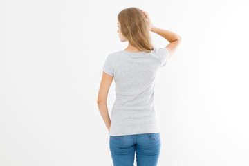 Obraz premium Woman in template blank t shirt isolated on white background. Back view. Mock up. Copy space.