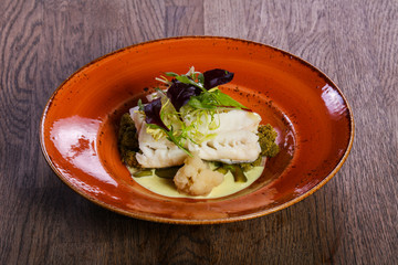 Steamed fith with salad