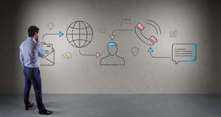 Businessman watching thin line social network icons interface