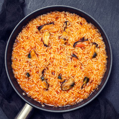 rice with seafood in dish