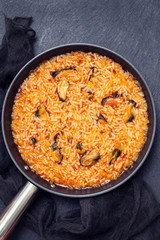 rice with seafood in dish