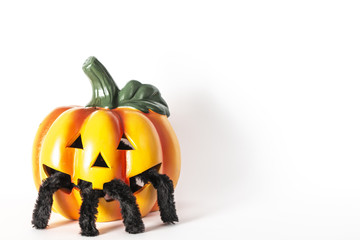 Pumpkin and spider with spider web. Happy Halloween