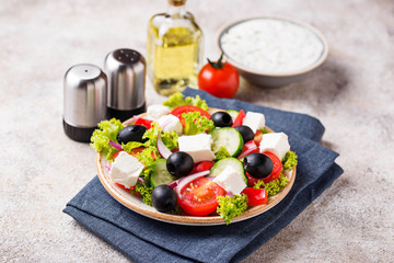 Traditional Greek salad with feta, olives and vegetables