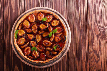 Spicy plum crostata cake