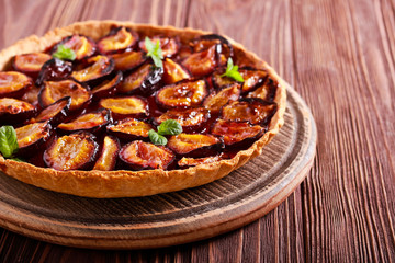 Spicy plum crostata cake