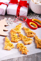 Fototapeta na wymiar Pistachio topping christmas tree biscuits