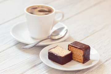 Slow morning with coffee and sweet wafers in chocolate coating