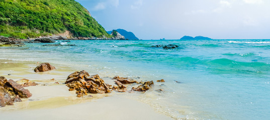 Beautiful beach. Rocks and sandy Tropical Holiday, Summer holiday and vacation concept