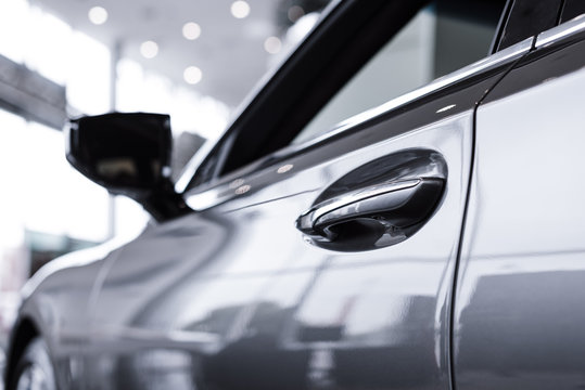 close up view of luxury shiny car in auto salon