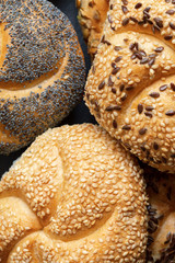 ariety of bread rolls, close up, vertical composition