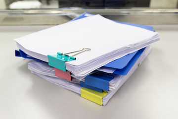 file folder and Stack of business report paper file on the table in a work office, concept document...