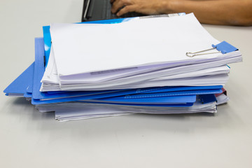 file folder and Stack of business report paper file on the table in a work office, concept document...
