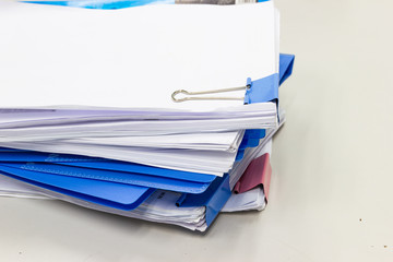 file folder and Stack of business report paper file on the table in a work office, concept document in work office