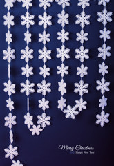 Greeting Card Happy New Year and Merry Christmas. Background of snowflakes.