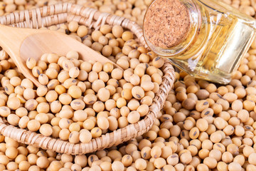 Soybean oil on a wooden background. rustic style