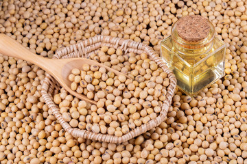 Soybean oil on a wooden background. rustic style
