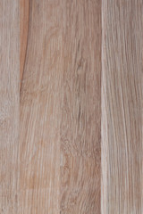 Natural background, texture of an oak. The vertical image has a wooden texture. grooved board