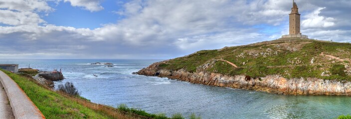 Landscape of Tower of Hercules in the Galicia capital city La Coru&ntilde;a on its rocks promontory on the sea