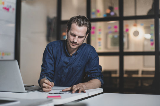 Adult male working late in an office