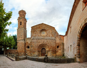 Obraz premium The brick made Veruela Monastery (Monasterio de Veruela) spanish romanesque facade and renaissance bell tower in Aragon, Spain