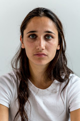 Fototapeta premium Portrait of a Mixed Race Young Woman Looking at Camera