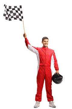 Racer holding a checkered flag and a helmet